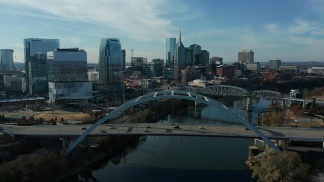 alt day flying over Korean War Vet Bridge towards Nashville skyline