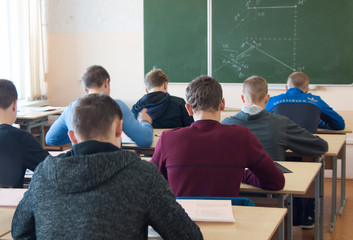 students sit in the classroom during the lessons