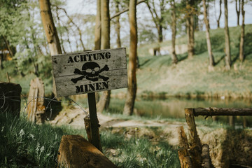 Danger Minefield with warning message board