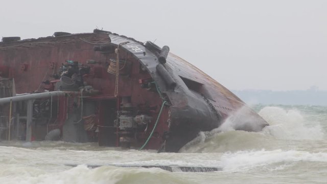 Odessa, Ukraine 11.22.2019: The wreck of the tanker "Delfi" on the Odessa beach. Ecological disaster - oil spill on city beaches as a result of a shipwreck.
