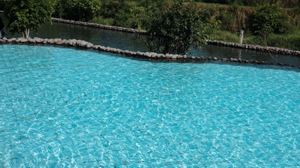 swimming pool in tropical resort