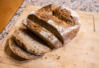 Fresh bread on wooden board