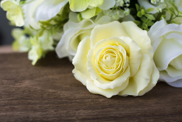 Gumpaste Rose on wooden background with .Selective focus