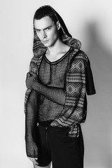 Muscle strong beautiful stripped male model portrait on isolated font background with shadow