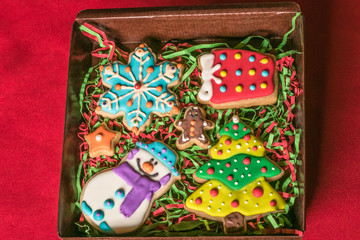 Fototapeta na wymiar Do you want a Christmas Cookie. These are homemade Cookies ready to give as a special present for Christmas