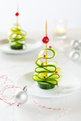 Cucumber Christmas tree, funny food for kids. Christmas food background.