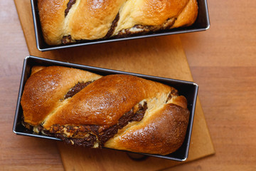 Homemade tasty brown cake. Christmas bakery concept. Cooking a sweet aromatic organic cake for dessert.