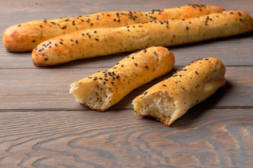Homemade baking, Cheese sticks  on wooden background