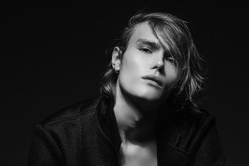 Muscle strong beautiful stripped male model portrait on isolated font background with shadow