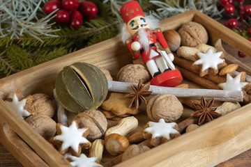 christmas cookies and spices on wooden background - obrazy, fototapety, plakaty