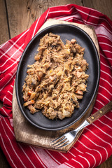 Traditional polish sauerkraut (bigos) with mushrooms and meat.