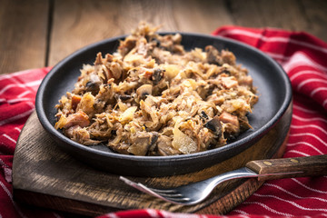 Traditional polish sauerkraut (bigos) with mushrooms and meat.