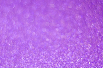 Abstract festive pink bokeh background with shining defocus sparkles. Blurred glitters shimmering dust macro close up, copy space for text logo