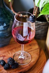Red Wine in a glass on a wooden table