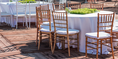 patio cafe restaurant outdoor space table and chairs exterior environment preparing for some event