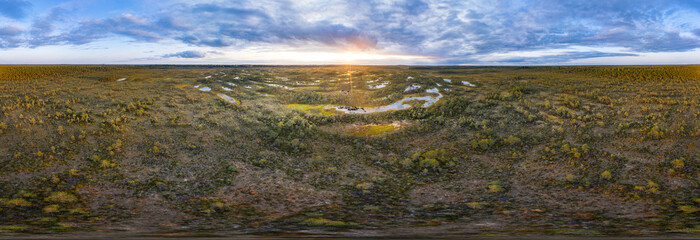 Sunrise in the bog landscape. Misty marsh, lakes nature environment background