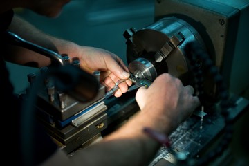 Obraz premium Old metal lathe machine, retro machine background.