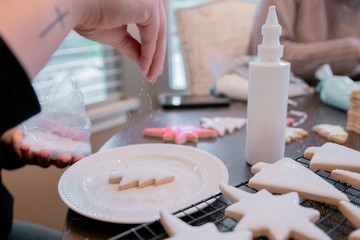woman making christmas cookies