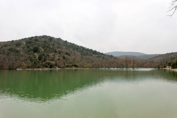 Obraz premium View to lake Sukko in the mountains with green water, Krasnodar krai, Russia
