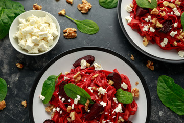 Roast Beetroot Pasta with spinach, walnuts and feta cheese. healthy food