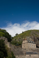 Fototapeta na wymiar A Dumbarton Rock Castle on a sunny summers day in Scotland
