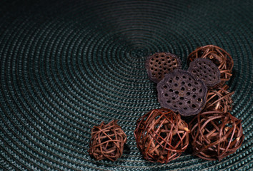 lotus flowers and braided branches on a green backgraund