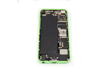 The disassembled phone is waiting for repair. Isolated from the background.