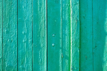 türkise Bretterwand 