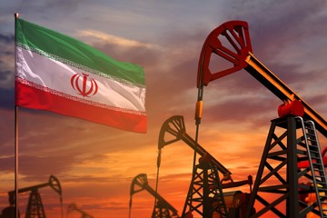 Iran oil industry concept. Industrial illustration - Iran flag and oil wells with the red and blue sunset or sunrise sky background - 3D illustration