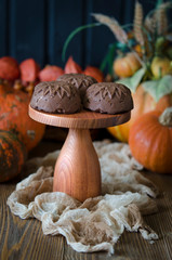 Chocolate dessert with pumpkin on agar on a stand