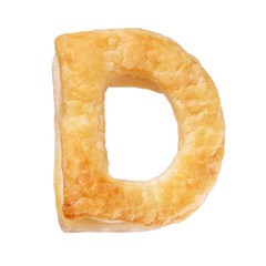 Letter D made with cookie or biscuit isolated on white