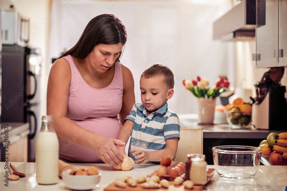 Sticker pregnant woman and son making cookies