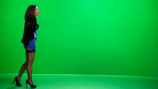 Beautiful Woman Prostitute In Short Dress Waiting For Client On Green Screen
