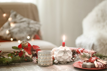 Beautifully decorated Christmas table in the living room.