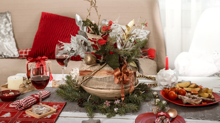 Beautifully decorated Christmas table in the living room.