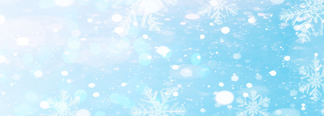 Naklejka na ściany i meble snowflakes and ice crystals isolated on blue sky - winter background panorama banner long