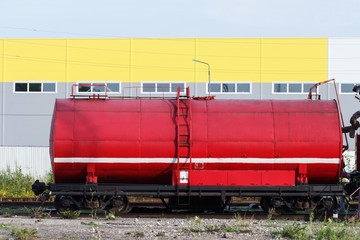 Fototapeta na wymiar fire wagon. fire train, red carriage and rails.