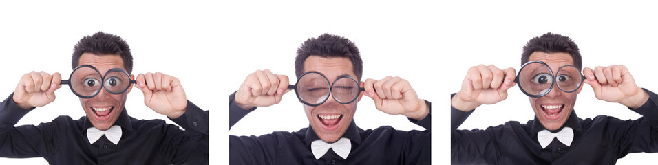 Funny man with magnifying glass