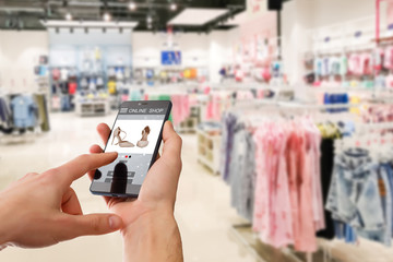 woman using digital tablet in a store