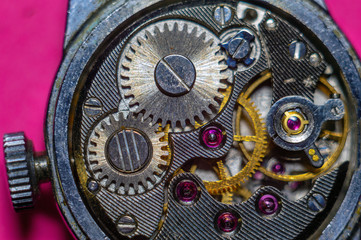 The mechanism of a wrist mechanical watch close-up.