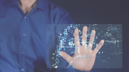 Abstract the launch of the computer game. A person touches a futuristic digital screen on which a virtual gaming joystick appears. New virtual reality. - Powered by Adobe