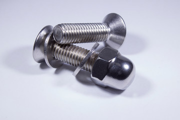 Countersunk bolts from stainless steel on a white background.