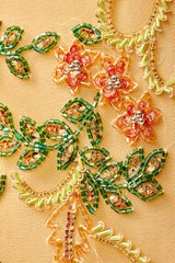 Fabric with sequins and sequins of bright colors. Fashion glitter fabric, sequins. Shiny surface