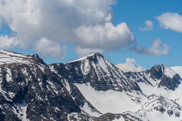 Low angle landscape of mountain tops in winter in Rocky Mountain National Park in Colorado