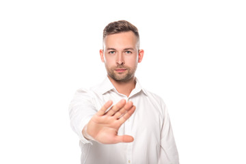 confident businessman in white shirt showing refusal gesture isolated on white