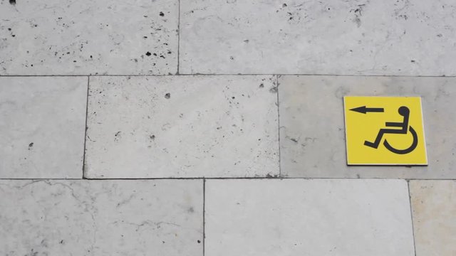sign disabled wheelchair person copy space marbles blocks. design