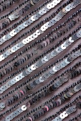 Fabric with sequins and sequins of bright colors. Fashion glitter fabric, sequins. Shiny surface