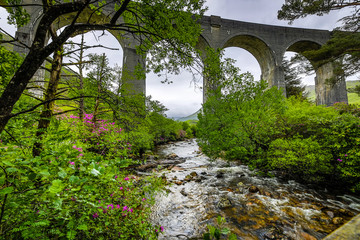 Old bridge and picturesque Scotland morning landscape.