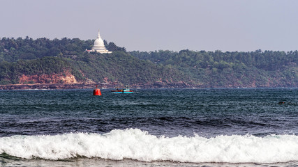 Distant view of the Rumassala temple in Galle, Sri Lanka.