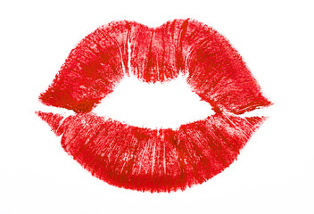 Imprint or print of red lipstick on a white background, isolated. Make-up female lips close up. Concept of love, makeup and beauty. Sexy red lips on white, kiss.